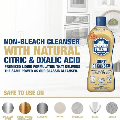 Bar Keepers Friend liquid cream rust stain remover bottle being applied to stainless steel kitchen sink