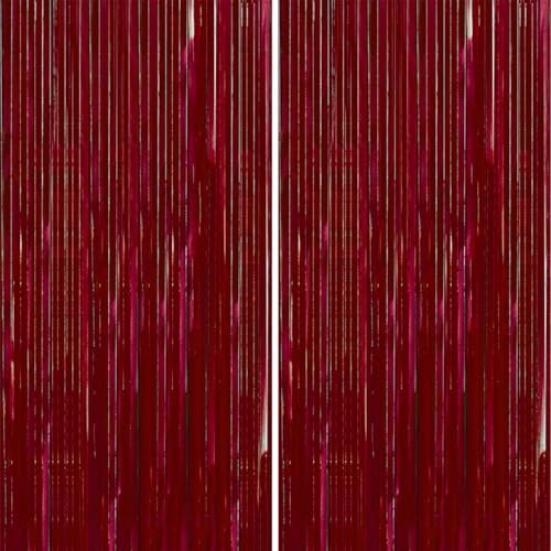 Two pieces of PartyWoo red foil fringe curtains installed on a doorway showing the full 8.2 feet length coverage.