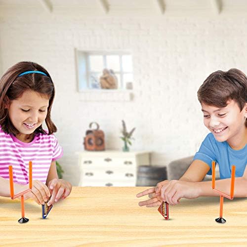 Two players enjoying the ArtCreativity tabletop finger football game in an indoor setting.