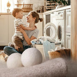 Premium laundry accessories pack highlighting the reusable wool balls for energy efficient drying.