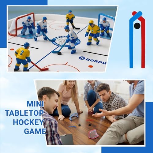 Hand powered tabletop hockey game pucks and sticks setup on smooth surface