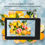 Ciciglow handheld digital media player being used outdoors for camping entertainment.