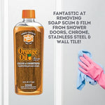 Holloway House cleaner removing soap scum from shower door
