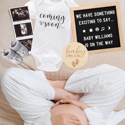 Premium wooden sign and soft knit baby booties from the Blinking Stars announcement set