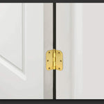 Close up of rounded corner brass door hinge with removable pin