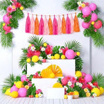 Aimto colorful tissue paper fringe garland hanging on a wall as birthday party decorations