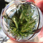 Close-up shot of the seventy millimeter clear acrylic ball emphasizing its zero internal distortion structure.