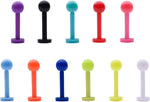 Assorted clear helix and lip piercing retainers in packaging.