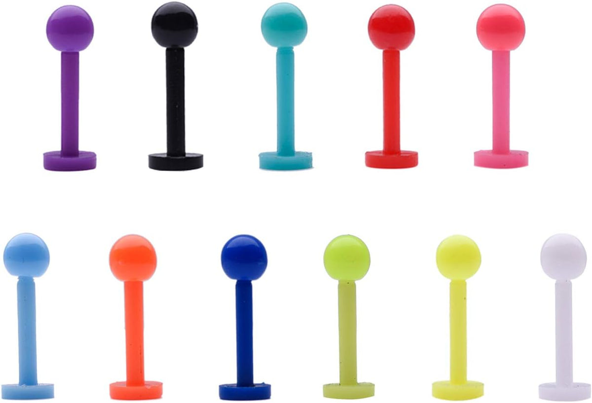 Assorted clear helix and lip piercing retainers in packaging.
