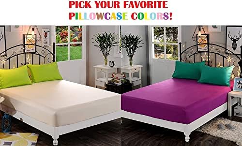 White queen fitted sheet spread neatly on mattress