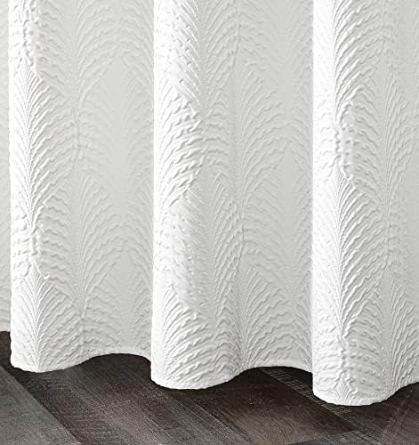 Gibelle luxury hotel style white curtain installed on a rod with the included twelve durable hanging hooks.