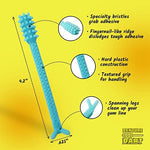 Back view of the denture glue cleaner highlighting the unique fingernail-like scraping ridge
