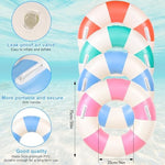 Four colorful striped swim rings for pool parties