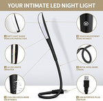 Zonon eye care notebook light plugged into a laptop USB port illuminating the keyboard in a dark room setting.