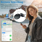 Waterproof Bluetooth item locator tag being attached to a set of keys.