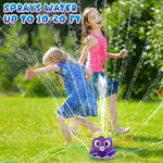 Toddlers enjoying splashing fun with outdoor octopus sprinkler