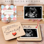 Close up view of the ultrasound photo slot holding a baby sonogram image inside the wooden keepsake frame.