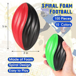 Toddler holding a five inch spiral foam sports ball indoors