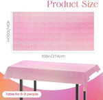Close up of shiny holographic pink foil texture on party tablecloth