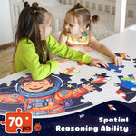 Assembled seventy piece circular space puzzle showcasing colorful planets and stars on the floor.
