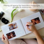Zicoto guest book open showing lined pages and Polaroid space