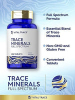 Close up view of Carlyle full spectrum trace mineral supplement tablets highlighting clean white color