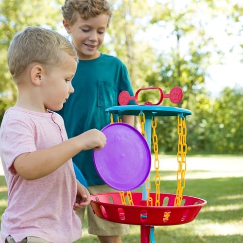 Action shot of family using Chuckle And Roar disc golf set outdoors