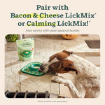 Woof LickMat in use during dog bath time