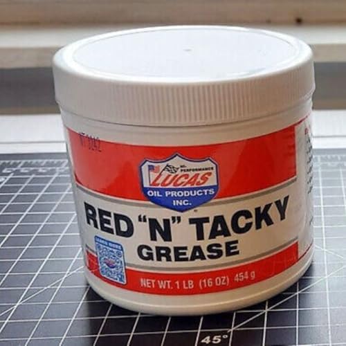 Extra tacky red grease tub open showing thick premium lubrication texture