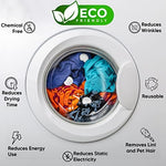 Raytrade organic dryer balls being placed into a laundry machine to reduce wrinkles.