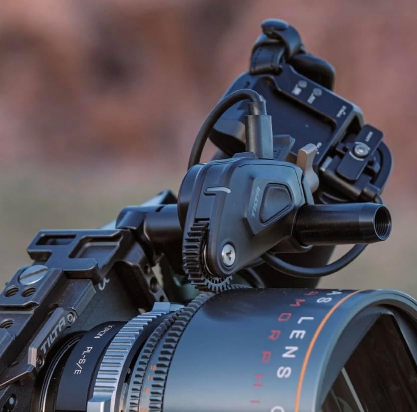 Color coded LED status indicator display visible on the premium cinema lens motor shell.