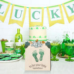 Beeveer St Patricks Day baby milestone card displayed as decorative nursery wall art.