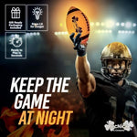 MCNICK & COMPANY light up football glowing vibrant neon orange in a dark backyard setting during a night match.