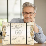 Close up of 60th birthday signature board gold badge detail
