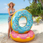 Large sprinkle covered inflatable donut tubes for adults