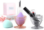 Jyukan makeup sponge drying stand placed on a modern vanity table