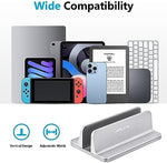 Side angle view of the silver metallic notebook dock holding a premium laptop vertically