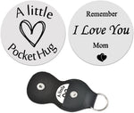 Double sided stainless steel engraved token closeup