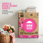 WBM laundry detergent pods being placed in a washing machine drum for deep cleaning.