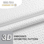 Close up shot of the white embossed textured fabric showing the premium waffle weave design detail.