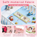 Amzoya pink cloth baby book being held by parent for size comparison