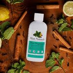 Usage demonstration of Mint Naturals cleaner in kitchen sink