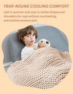 YnM five pound heavy lap throw draped over a chair for home decor