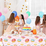 Side angle view of a decorated dessert station featuring the colorful sprinkle layout