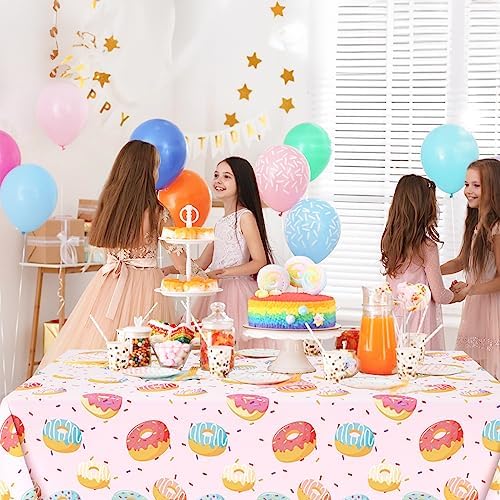 Side angle view of a decorated dessert station featuring the colorful sprinkle layout