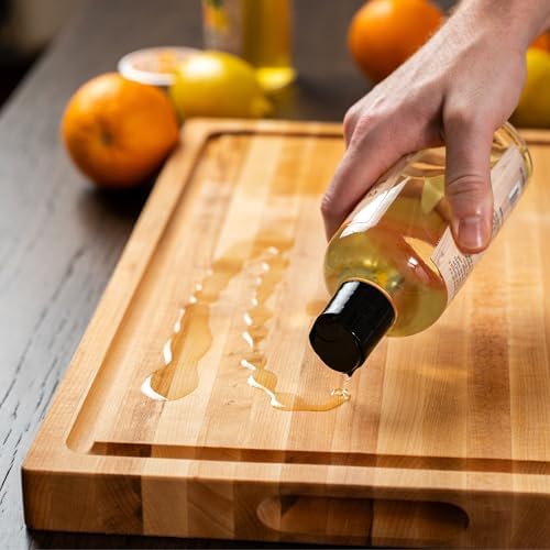Close up of wooden butcher block treated with Clark's oil