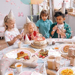 Detailed view of scalloped bow plates for party decorations