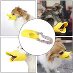 Small dog wearing yellow duck bill muzzle for training