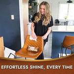 Air Jungles leather conditioner wipes cleaning a brown leather sofa for home maintenance.