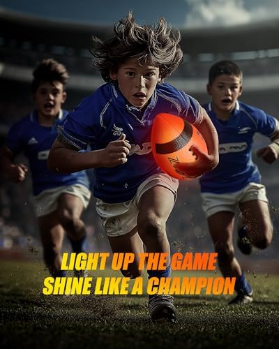 ZXYZZ orange LED football glowing brightly on a backyard lawn at night